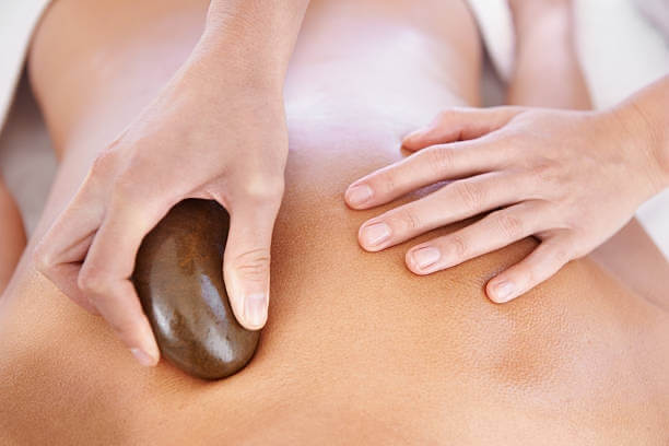 hot stone massage on back